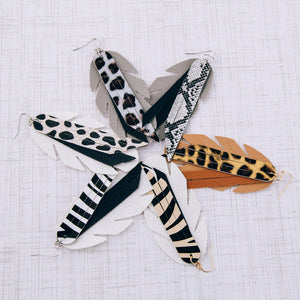 Faux leather zebra print feather tassel statement earrings